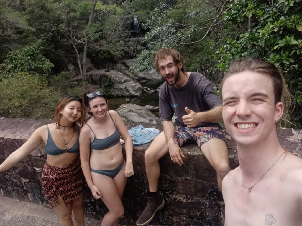 Backpackers in Australia at Crystal Creek in Far North Queensland